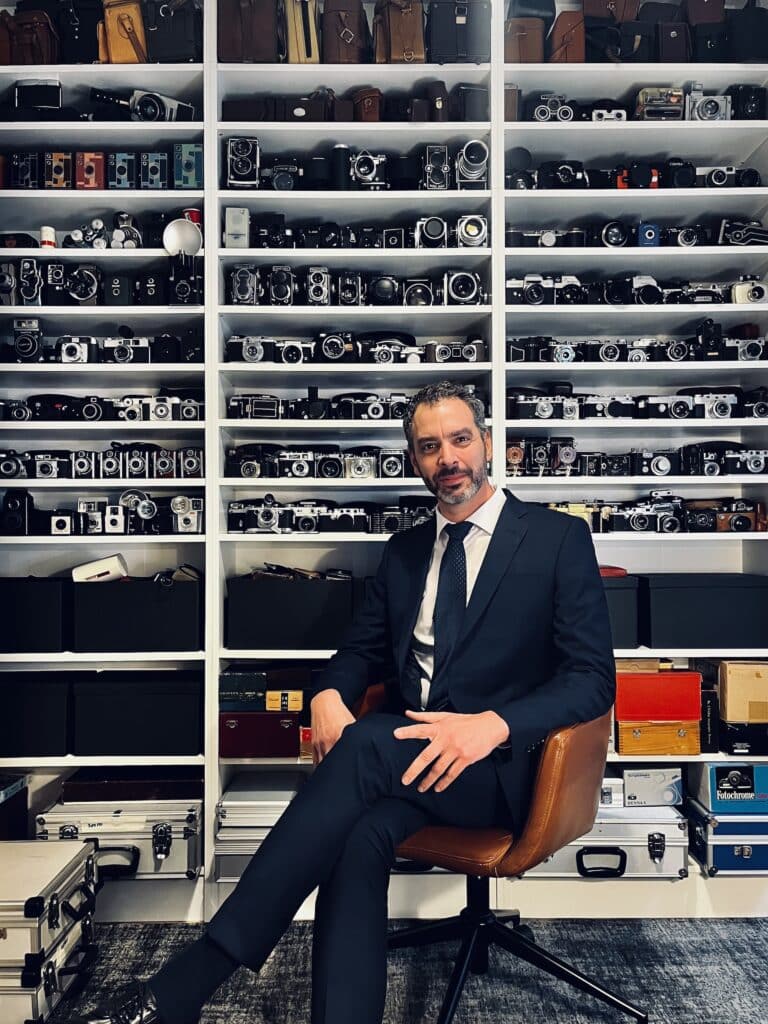 Federico in front of his collection. © 99 Cameras Club
