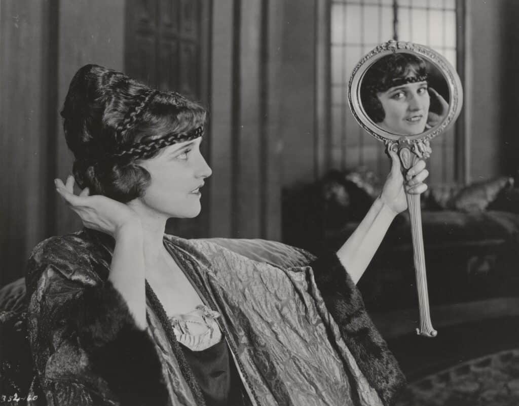 Agnes Ayres looking at mirror, "Forbidden Fruit"; 1920 © Karl Struss (1886-1981)