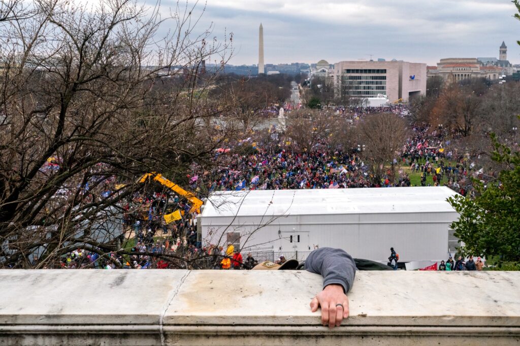 Washington DC. USA. 2020. Following an inflammatory speech by President Trump, protestors objecting to the certification of Joe Biden by Congress storm the Capitol. They were briefly blocked by police before gaining entry, and wreaked havoc before being expelled with few arrests. One protestor was shot and killed