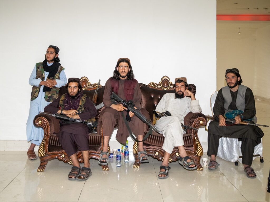 Taliban guard a meeting of senior leadership. Kabul, Afghanistan, 2022 © Peter van Agtmael/Magnum Photos