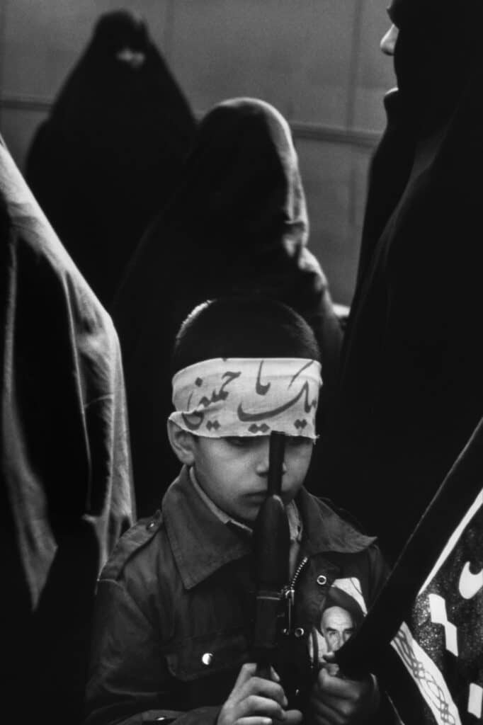 Children in arms, Iran, 1979-83 © Manoocher Deghati