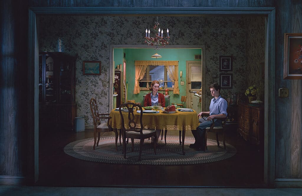 Gregory Crewdson, Untitled (Sunday Roast), Fromthe series: Beneath the Roses, 2003-2008. Digitalpigment print. The ALBERTINA Museum, Vienna,Permanent loan – Private Collection © GregoryCrewdson