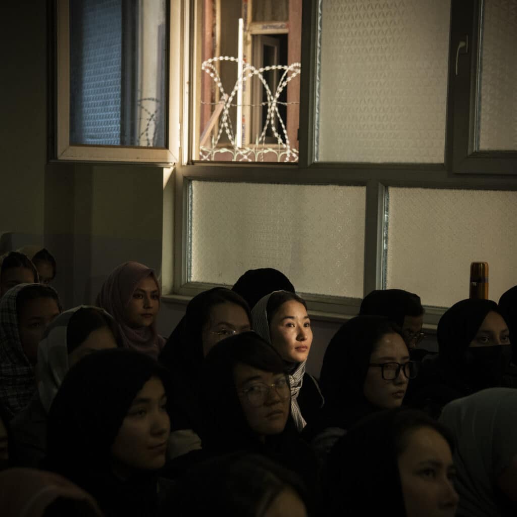 Kabul, Kabul, Afghanistan, February 17, 2024. A private institute in the West of Kabul, where girls follow the American curriculum in English, but cannot obtain any Afghan official education certificate, nor can they go to university in Afghanistan, closed for women. This is a rare instance where the school has managed to secure the local Taliban's approval to shut a blind eye on the school's operation with teenage girls. 700 female highschool students study at this institute everyday under strict security measurement while two armed security guards from the community watch the gate and girls enter and exit one by one, leaving their backpacks at the entrance. Despite suicide bombers' attacks that took place before the takeover, the institute remains full of girls, whose dreams are now to leave the country to continue their education abroad. © Kiana Hayeri for Fondation Carmignac