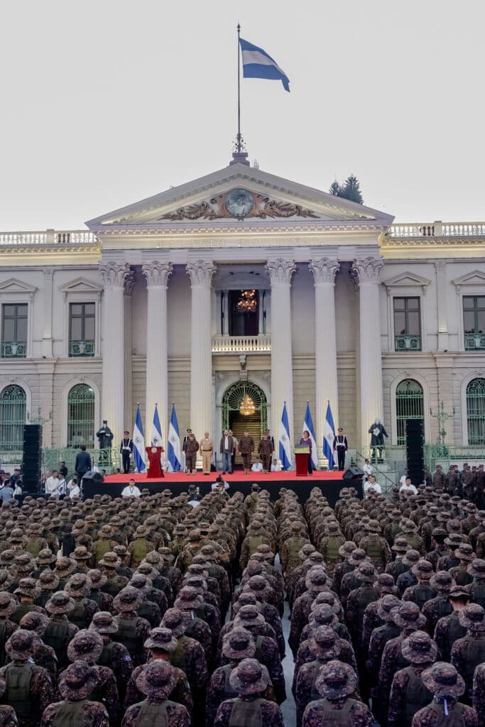 President Nayib Bukele (center, in a brown jacket) at a swearing-in ceremony for 1,400 soldiers in San Salvador in February 2020. The armed forces have gained enormous power under Bukele, who has downplayed its long history of human rights violations. © Fred Ramos