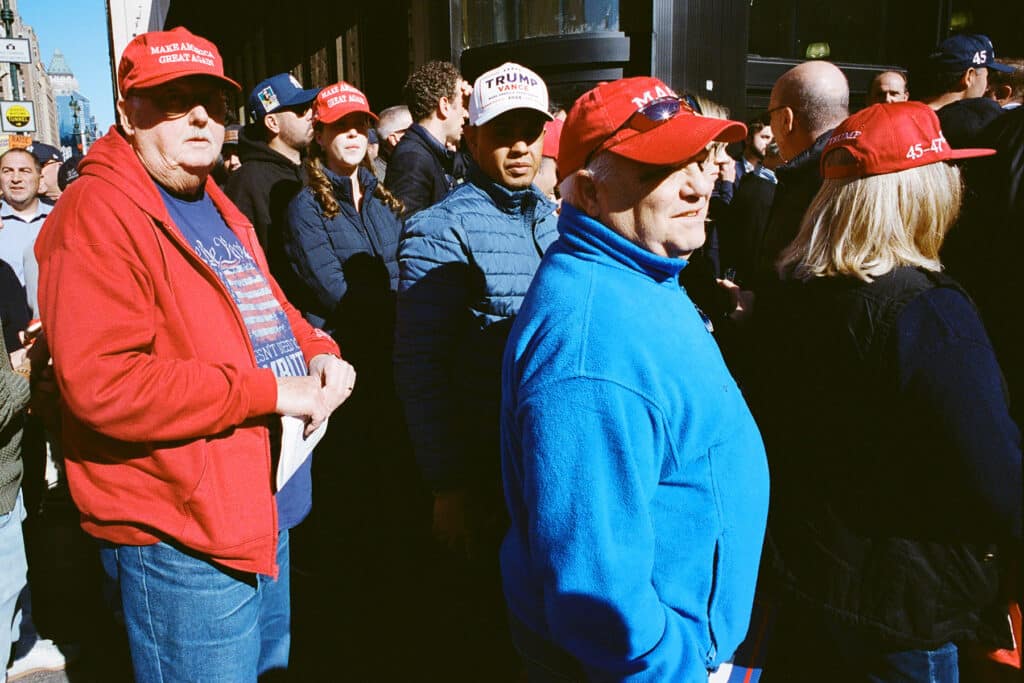 Trump Supporters waiting in line to get into the Donald Trump Rally at Madison Square Garden. New York City. October 27, 2024 © Robert E. Gerhardt