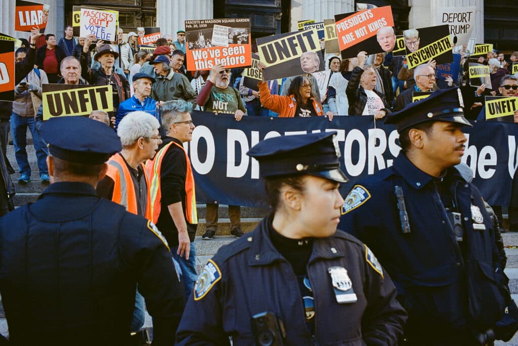 Police Line in front of Counter Protestors at the Donald Trump Rally at Madison Square Garden. New York City. October 27, 2024 © Robert E. Gerhardt