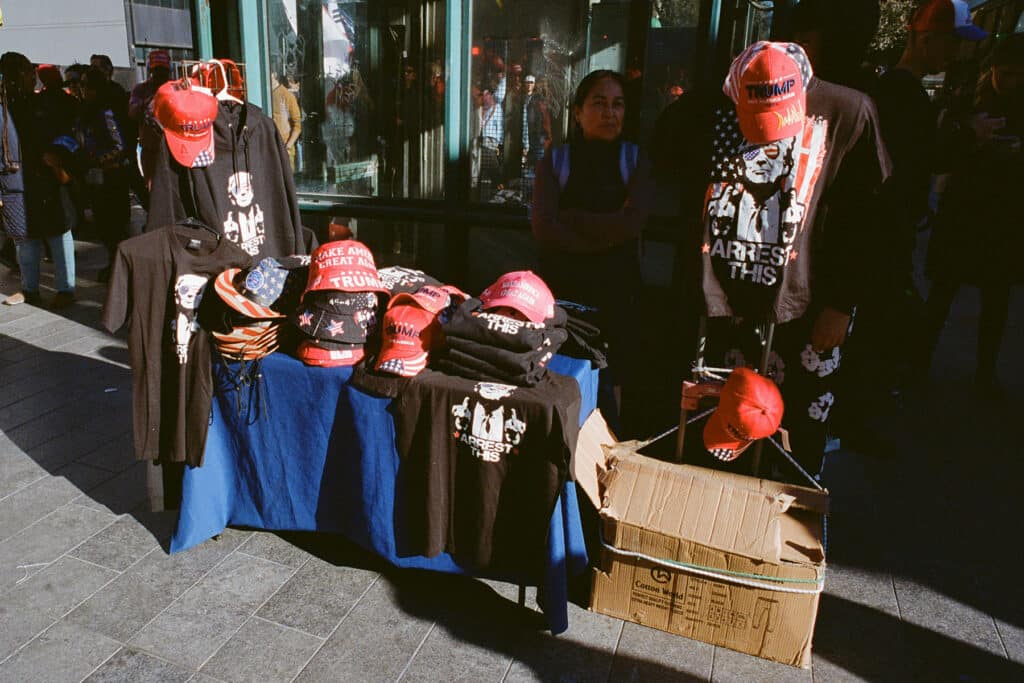 Pro-Trump Merchandise Stall at the Donald Trump Rally at Madison Square Garden. New York City. October 27, 2024 © Robert E. Gerhardt